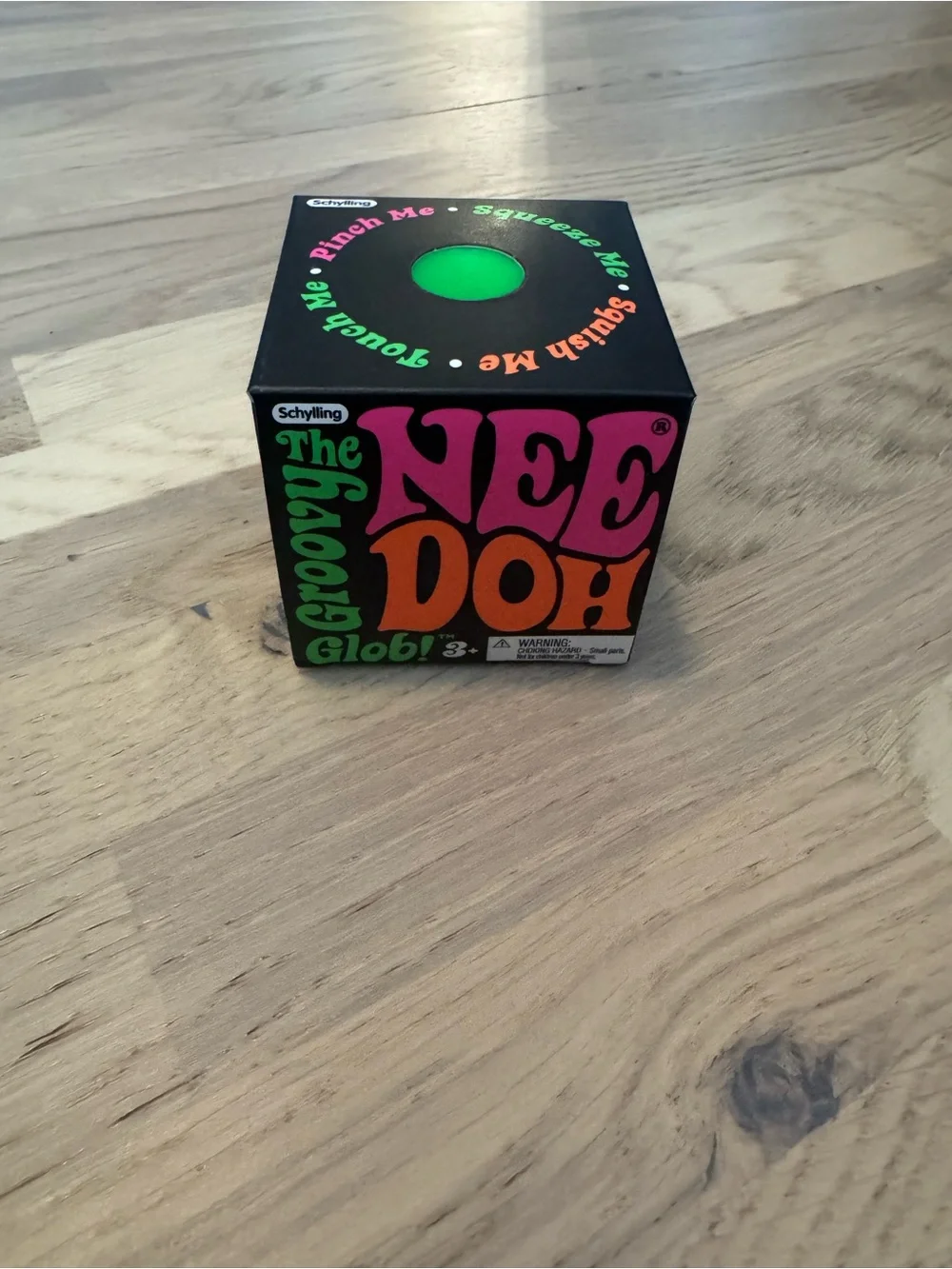 NeeDoh Crunchy Glob Kids Toy - Black Box with Green Plug
